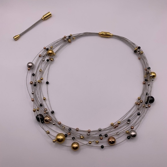 Funky multi strand adjustable necklace with gold and silver tone beads - Picture 7 of 7